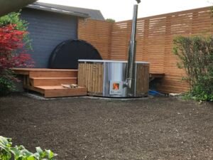 Integrerad vedeldad kamin för badtunna – 30 kW i 316 rostfritt stål